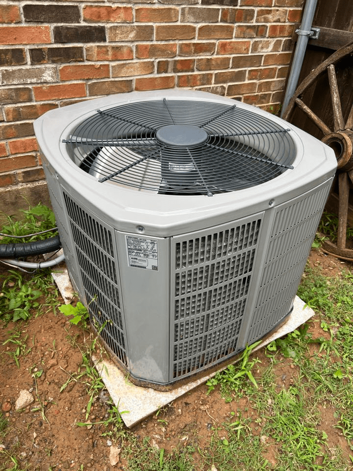 An outdoor AC unit Heat Pump Repair Service Keller TX | AC & Heat Solutions