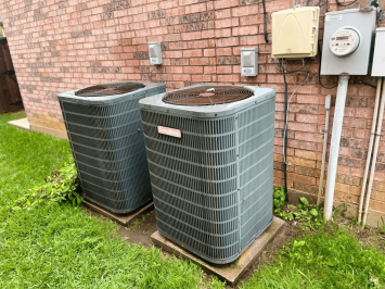 Two outdoor AC units AC Repair Service Grapevine TX | AC & Heat Solutions