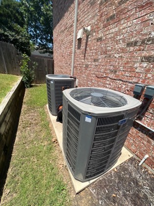 An outdoor AC unit that we replaced – AC & Heat Solutions will be there for your Keller AC needs. 
