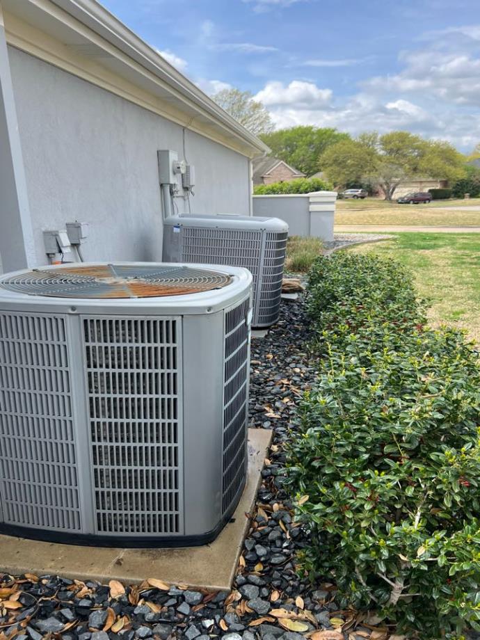 Two AC units in need of maintenance in Grapevine