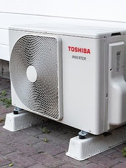Outdoor portion of a ductless mini split unit, both pieces will be fully inspected to make sure your unit is running its best.